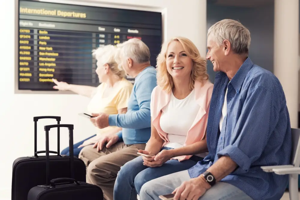 A couple sitting in an airport