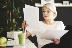 A woman reviewing paperwork